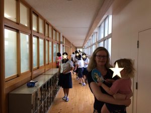 The author and her son at her main school, 11 years post-JET